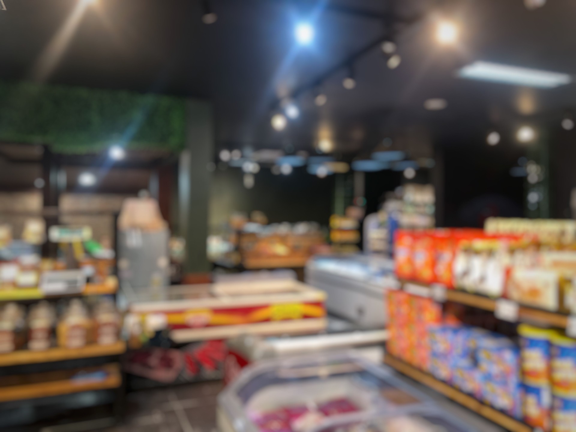 defocused photo of empty convenience store aisle